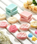 Assorted handmade soaps from the All In One Soap Making Kit For Grown Ups With 2.2 Lb Goat Milk Soap Base, Silicone Loaf Molds, Cutting Box.