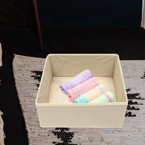 Totally Legit High Capacity Nonwoven Underwear And Sock Organizer Boxes with colorful rolled socks in a beige drawer.