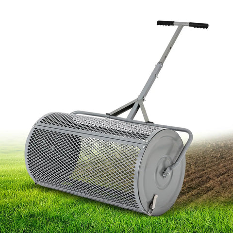 Large 27 Inch Compost Spreader for Lawn and Garden With Adjustable Handle Durable Roller Spreader on grass
