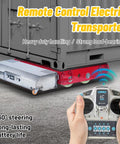 Heavy Duty 50 Ton Electric Machinery Skates With Wireless Remote Control And 360 Degree Swivel Polyurethane Wheels moving a container.