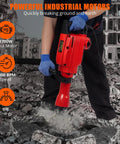 Heavy Duty Concrete Breaker Jack Hammer With 1700W Demo Power And Three Piece Chisel Bit Kit in use, breaking concrete.