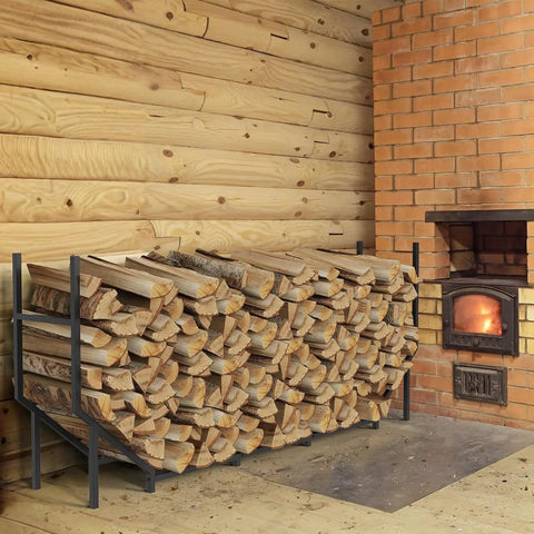 Six Foot Outdoor Firewood Rack Heavy Duty Metal Wood Holder Built For Up To 880 Lbs next to indoor fireplace on brick wall