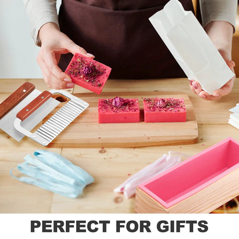 Person using Rectangular Soap Mold Kit With Cutter For DIY Soap Making, 42oz Flexible Silicone Loaf Mold With Wooden Box And Stainless Scrapers