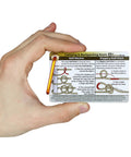 Hand holding Outdoor Knot Cards 22 Knots For Camping Backpacking And Scouts card with Half Hitches diagram and carabiner.