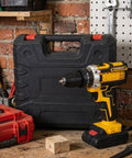 Badass 21V Cordless Drill And Rechargeable Electric Screwdriver Set For Home Workshop Projects, yellow and black tool beside a tool case.