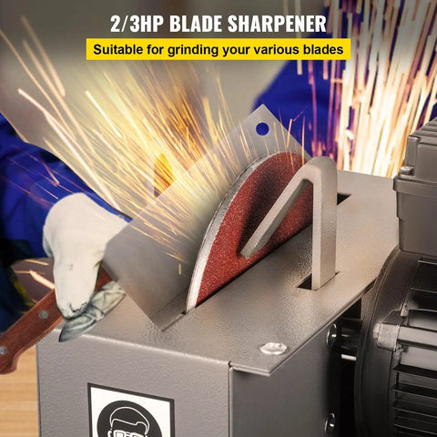 Heavy Duty 500W Bench Grinder Featuring 7 Inch Grinding Wheel For Sharpening Lawnmower Blades Knives And Scissors Adjustable 30 And 40 Degree Angles, sparks flying from blade sharpening.