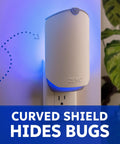 Plug In Bug Zapper For Straight Up Home Pest Control Killer Against Fruit Flies And Those Dang Gnats With Uv Light And No Mess Adhesive Cartridge Indoor Fly Traps 3 Refill Pack mounted on wall with blue light.