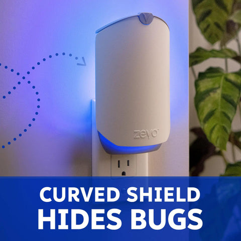 Plug In Flying Insect Trap For Fruit Flies And Gnats Using Blue And Uv Light With Zero Mess Adhesive Cartridge mounted on a wall.