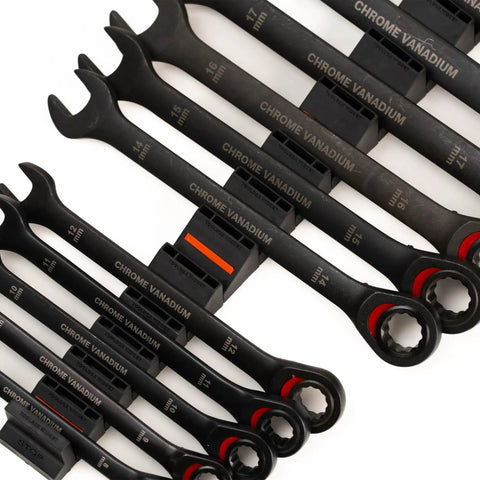 Close-up of Basics Wrench Organizer Kit with 16 rubber holders, modular system for tool drawers, showing Chrome Vanadium wrenches.