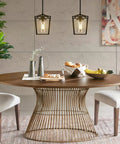 Black Farmhouse Kitchen Island Pendant Light With Metal Cage And Clear Glass Shade over a dining table