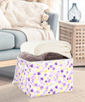 Top Tier Foldable Storage Bin With Sturdy Side Grips For Bedroom Organization Durable Oxford Fabric Collapsible Crate With Snug Flip Lid To Keep Your Room Clutter Free holding blankets in a cozy living room setting.