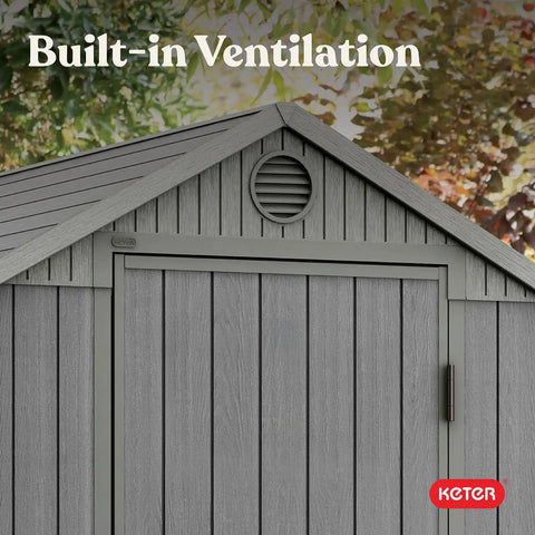 Lockable Resin Outdoor Storage Shed Graphite Gray Four By Six Feet with built-in ventilation for outdoor garden tools.