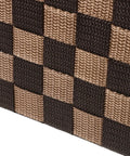 Close-up of the woven fabric of Top Shelf Clothing Storage Bin With Reinforced Metal Frame And Grippy Polyester Weave Handles.
