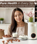 Woman in kitchen with 8-In-1 Nut Milk Maker With 32 Oz Capacity For Almond Milk Oat Milk Soy Milk Coconut Dairy Free Milks