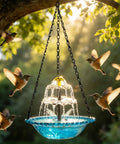 Solar Bird Bath Fountain With Hanging Cascade Water Bowl And Pump Outdoor Garden Decor For Hummingbirds Easy Sun Powered Water Feature That Runs On Direct Sunlight No Batteries Needed Blue hanging in a tree with birds