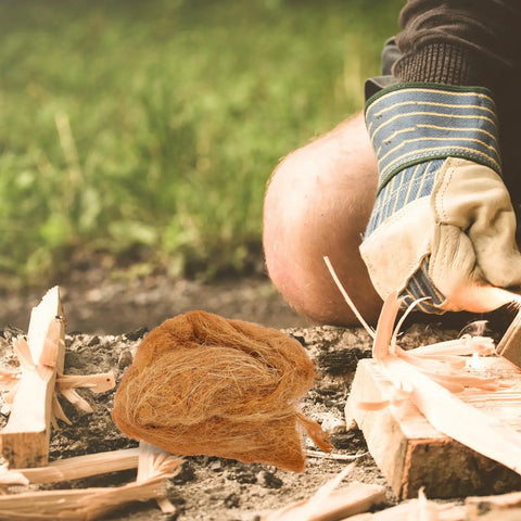 Natural Jute Fire Starters 4 Pack For Camping And Hiking on ground next to kindling shavings, outdoor setting