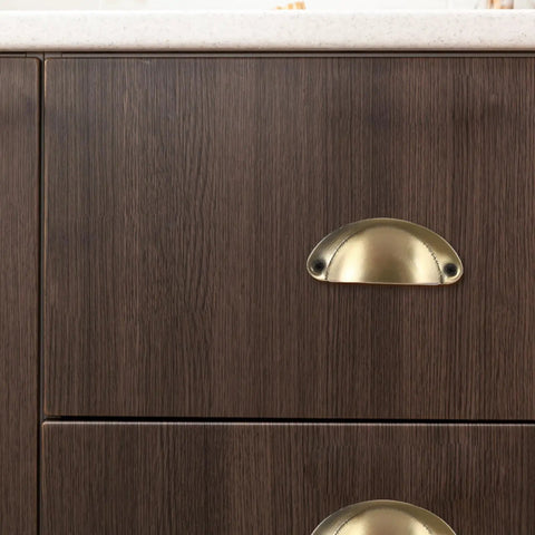 Close-up view of Retro Copper Finish Iron Cabinet Pulls 10 Pack Sturdy Drawer Handles on dark wood drawers.