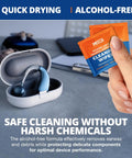 Two orange hearing aid cleaning wipe packets beside an open white case with a blue hearing aid.
