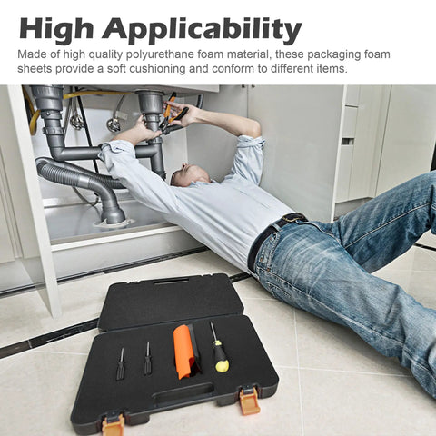 Two Pcs Black Polyurethane Foam Sheets Cuttable Toolbox Inserts And Storage Organizers Soft Cushion For Drill Cases on the floor with tools.