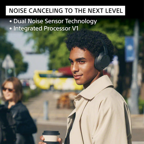 Person wearing Lightweight Noise Cancelling Wireless Headphones With Alexa Built In Ultra Comfortable Over Ear Fit At 192g