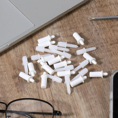 40 Pack Spring Loaded Shutter Repair Pins with Dual Sizes on wooden surface for fixing blinds and cabinet hinges