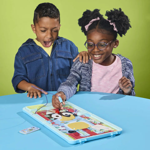 Kids enjoying the Legit Awesome Bluey Pediatrician Board Game For Kids Featuring Electronic Talking Sound Effects and All In One Carry Case.