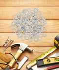 Heavy Duty Stainless Steel Split Lock Washers M8 100 Pack on wooden surface with tools and measuring tape.