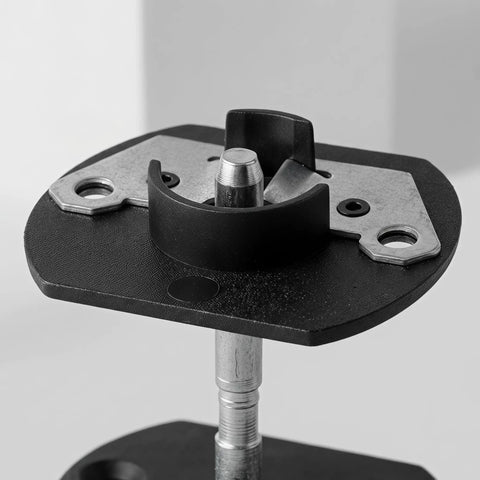 Close-up of pin-style hardware from Five Set Sectional Sofa Connector Bracket Kit with interlocking features visible.