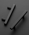 Two matte black cabinet pulls with three inch handles, showing stainless steel durable hardware, from Thirty Pack Matte Black Cabinet Pulls.