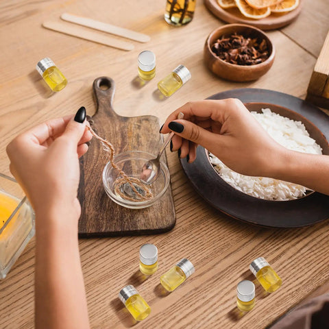 Hands mixing ingredients with spoons beside Grab This Top Shelf Haul Of Clear Two Milliliter Mini Glass Vials With Heavy Duty Silver Caps.