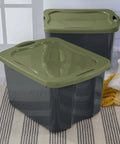 Roomy 17.5 Gallon Plastic Storage Bin With Secure Stackable Lid And Opaque Base, Full Grip Handles, Big Time Storage Container For Duds Bedding Dorm Gear And Zero Hassle Organization stacked with green lids on a striped rug.
