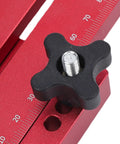 Close-up of Thin Jig Table Saw Guide Pro Grade With Secure Lock Design, red aluminum body, black lock knob, and measurement scale.