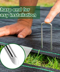 Beefy 6 Inch Landscape Staples 11-Gauge Galvanized U Shaped Yard Pins being used to secure weed barrier fabric
