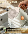 14 Oz Travel Electric Kettle With Rapid Heating To 212 Degrees Fahrenheit Temperature Control Mug Warmer being rinsed in a sink