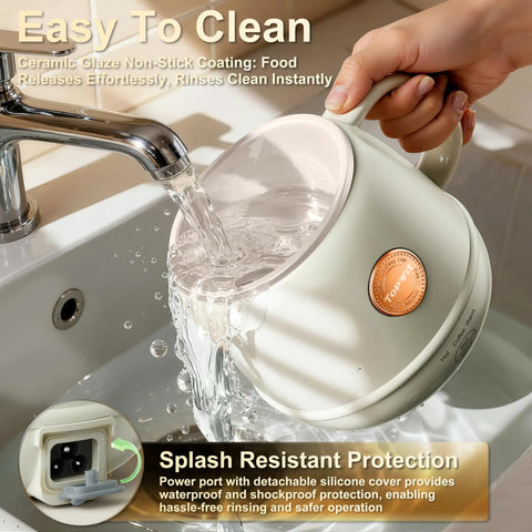 14 Oz Travel Electric Kettle With Rapid Heating To 212 Degrees Fahrenheit Temperature Control Mug Warmer being rinsed in a sink