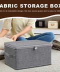 Slick Fabric Storage Bin With Combination Lock Waterproof Foldable Wardrobe Organizer Keeps Your Essentials Safe Collapsible Drawer Tote placed beside folded clothes.