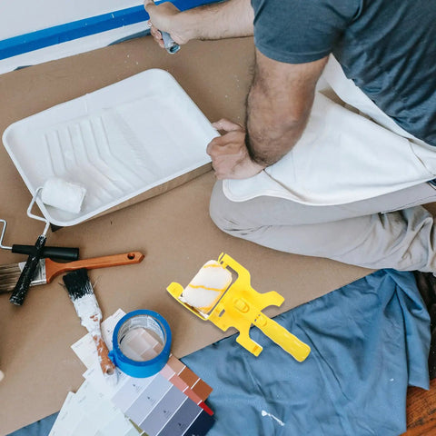 Smooth As Glass Paint Edger Roller Kit With Extra Sleeve For Crisp Wall Edges And Zero Paint Runoff Heavy Duty Handheld Painting Gear on a workspace.