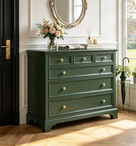 Rock Solid Brushed Gold Cabinet Knobs for Kitchen Drawers and Furniture, 1-1/4 Inch Round Hardware with Premium Zinc Build, Includes Mounting Screws, 10-Pack Set displayed on a green dresser with floral decor.