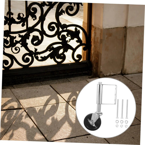 Heavy Duty Spring Loaded Gate Caster Wheels Set Featuring Rust Resistant Black Steel Build and Rock Solid Load Capacity For Hassle Free Swinging On Big Outdoor Property Gates, shown beside a decorative iron gate.