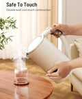 Pouring hot water from 1.7L Large Kettle With Temperature Control And LED Screen Quick Heat For Tea And Coffee 6 Presets 4 Hour Keep Warm