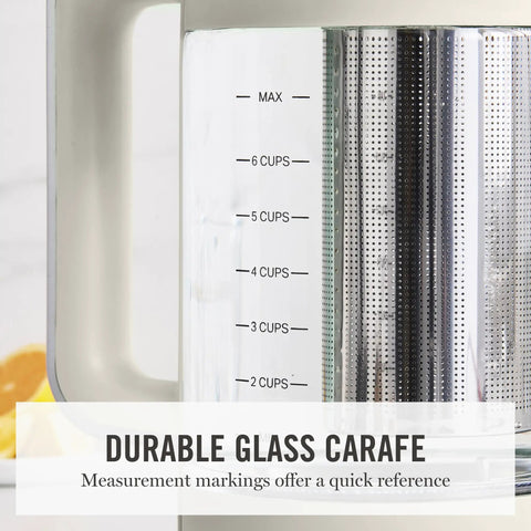 Electric Kettle With Removable Stainless Steel Tea Infuser And Glass Carafe 1.7L shown with measurement marks up to 7 cups