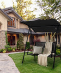 Two Person Porch Swing With Adjustable Canopy, Comfortable Fabric Seat And Heavy Duty Steel Frame in garden setting