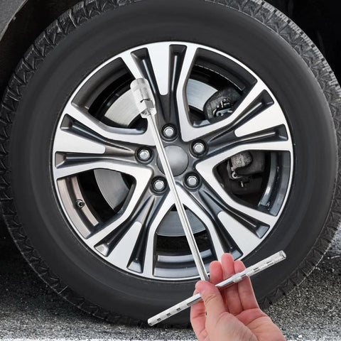 Straight Shooter T Handle Socket Wrench Set Forged From Heavy Duty Steel To Crack Open Stubborn Nuts And Bolts Without Breaking A Sweat on a car wheel.