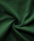 Close-up of Modern Green Tufted Modular Sofa Chair Right Facing Armless Sectional Module With Fluffy Accent Pillows fabric texture.