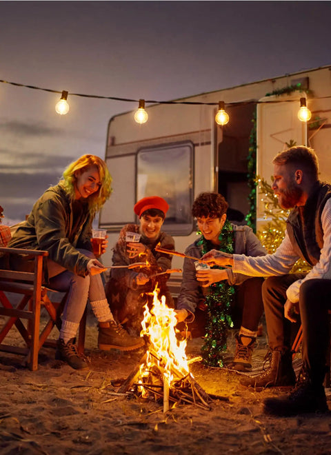 Group enjoying campfire under string lights using Led Replacement Light Bulbs For E12 Candelabra Base, Shatterproof Globe Bulbs