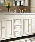 Twenty Pack Premium Gold Cabinet Knobs And Sturdy Drawer Pulls Featuring A Sleek Brushed Brass Finish on white cabinet.