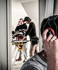 Man using Wireless Electronic Hearing Protector With Bluetooth Technology And External Noise Canceling Boom Mic For Clear Team Communication