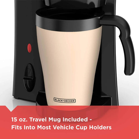 Close-up of Compact Brew And Go Personal Coffee Maker With Travel Mug, showing 15-oz mug fitting into black machine.