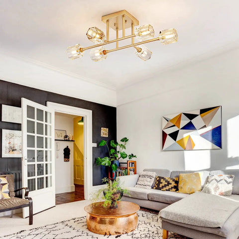 Modern living room featuring 6 Light Brushed Gold Semi Flush Mount Ceiling Light Fixture, glass shades, and geometric art.