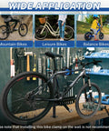 Height Adjustable Bike Repair Stand For Bench Mount, holding a black mountain bike in a garage setting, tools visible in background.